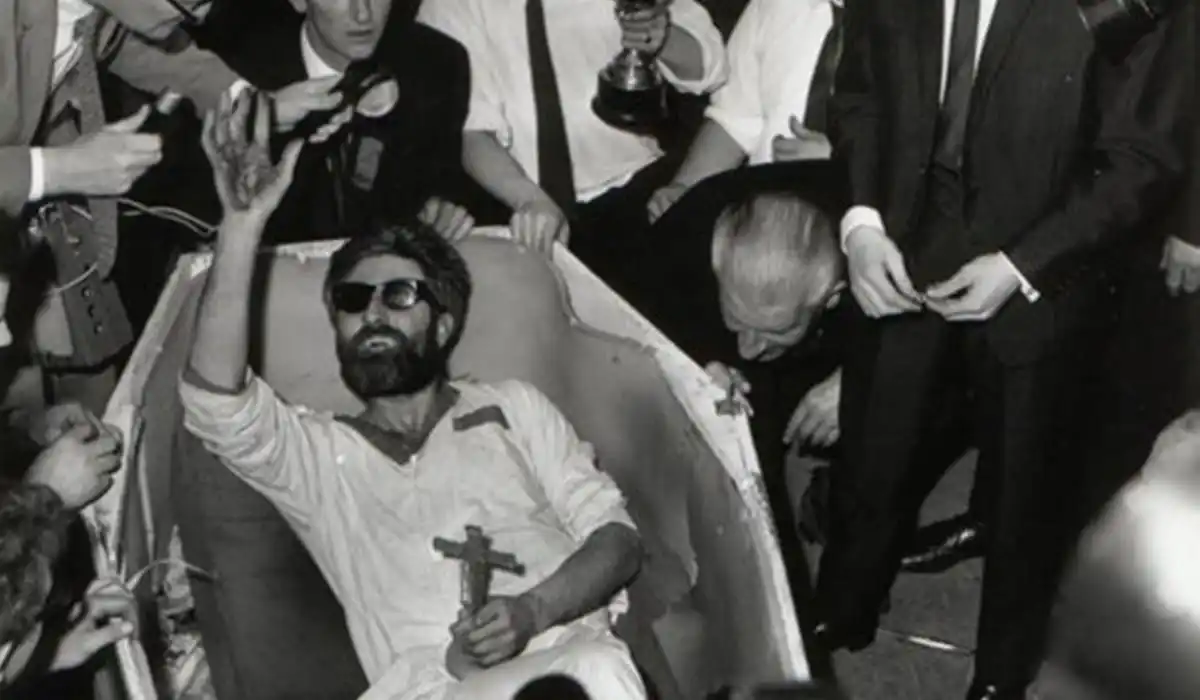 Mick Meaney in coffin with cross